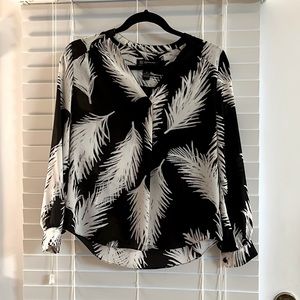 INC petite women’s top. Long-sleeve black with white print. Size 2P.